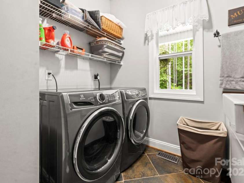 1956 Forest Ridge Drive, Stanley, NC 28164.  MLS# CAR4253801, YatesRealty ID 13330. Laundry room with sink