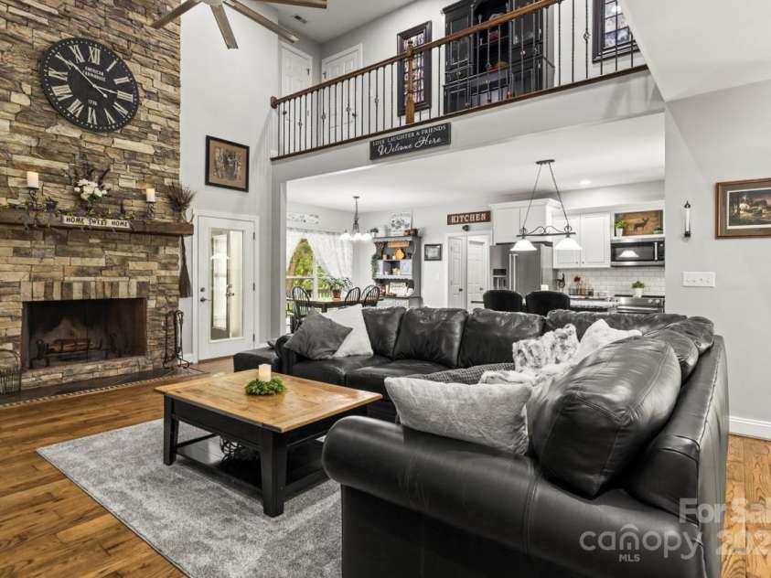 1956 Forest Ridge Drive, Stanley, NC 28164.  MLS# CAR4253801, YatesRealty ID 13330. Wood-burning fireplace in great room
