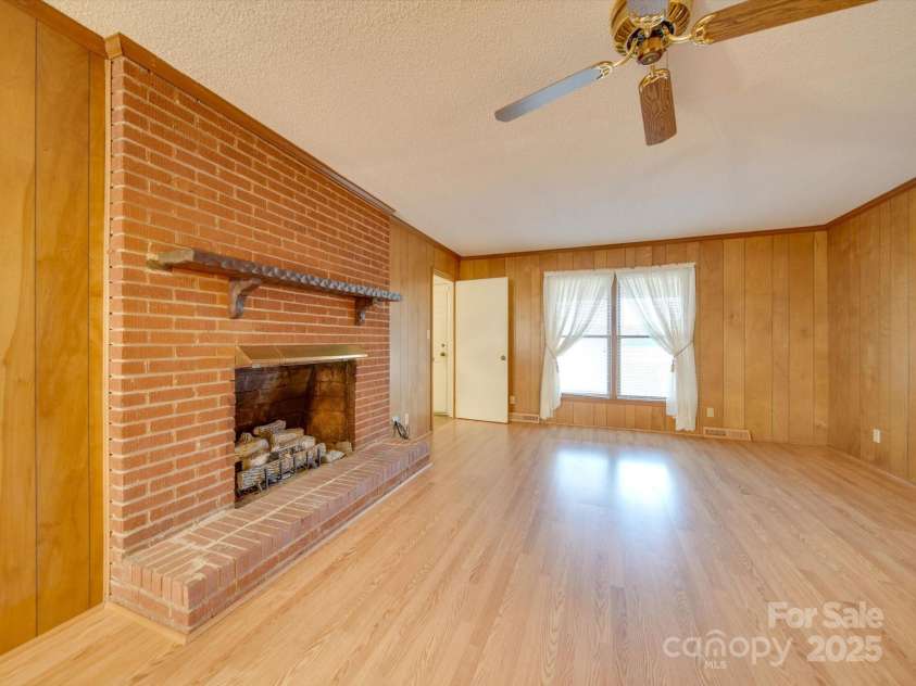3113 Old Pageland Marshville Road, Wingate, NC 28174.  MLS# CAR4274721, YatesRealty ID 13332. Fireplace in great room
