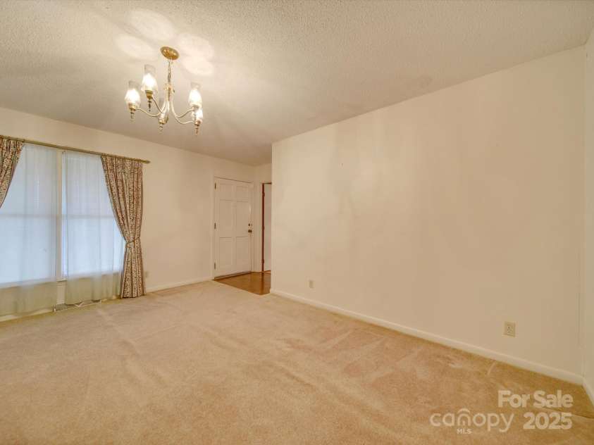 3113 Old Pageland Marshville Road, Wingate, NC 28174.  MLS# CAR4274721, YatesRealty ID 13332. Living room