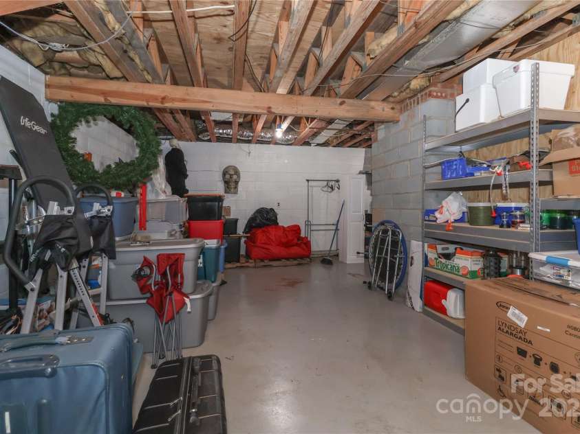 212 Davies Circle, Cleveland, NC 27013.  MLS# CAR4250221, YatesRealty ID 13334. Downstairs lots of storage.