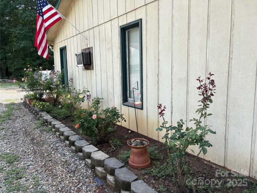 212 Davies Circle, Cleveland, NC 27013.  MLS# CAR4250221, YatesRealty ID 13334. Pretty Rose Bushes.