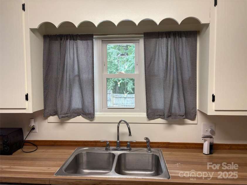 212 Davies Circle, Cleveland, NC 27013.  MLS# CAR4250221, YatesRealty ID 13334. Pretty window in kitchen.