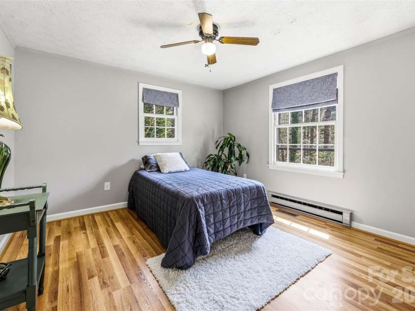 143 Rocky Ridge Road, Pisgah Forest, NC 28768.  MLS# CAR4364928, YatesRealty ID 13336. Guest bedroom