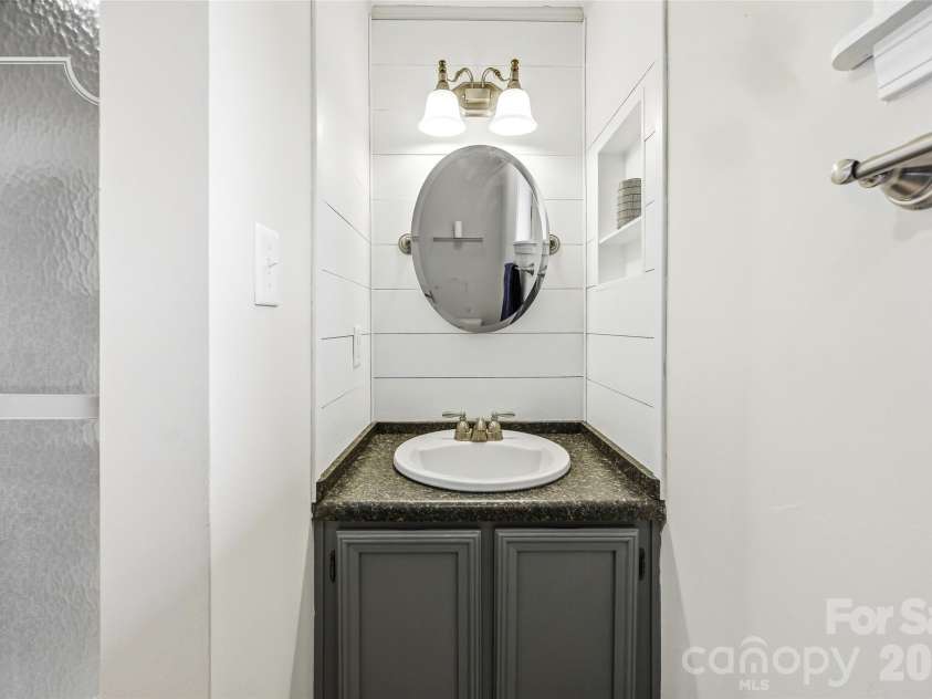143 Rocky Ridge Road, Pisgah Forest, NC 28768.  MLS# CAR4364928, YatesRealty ID 13336. Guest full bath