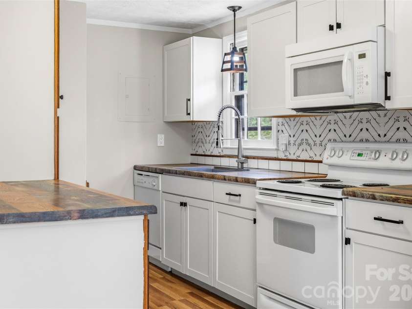 143 Rocky Ridge Road, Pisgah Forest, NC 28768.  MLS# CAR4364928, YatesRealty ID 13336. Kitchen