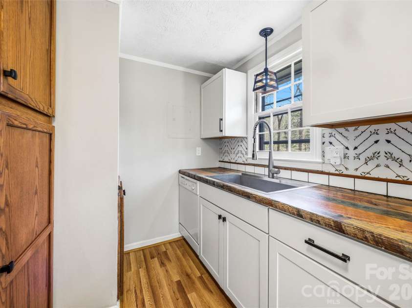 143 Rocky Ridge Road, Pisgah Forest, NC 28768.  MLS# CAR4364928, YatesRealty ID 13336. Kitchen