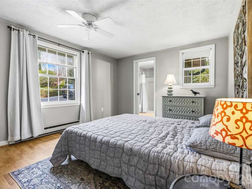143 Rocky Ridge Road, Pisgah Forest, NC 28768.  MLS# CAR4364928, YatesRealty ID 13336. Primary bedroom