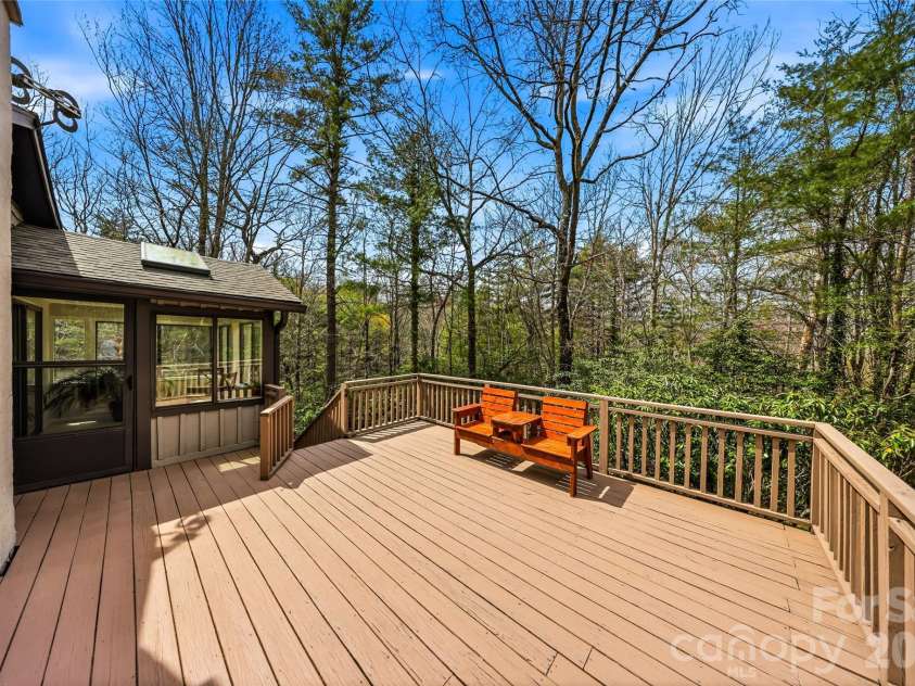 143 Rocky Ridge Road, Pisgah Forest, NC 28768.  MLS# CAR4364928, YatesRealty ID 13336. Side deck
