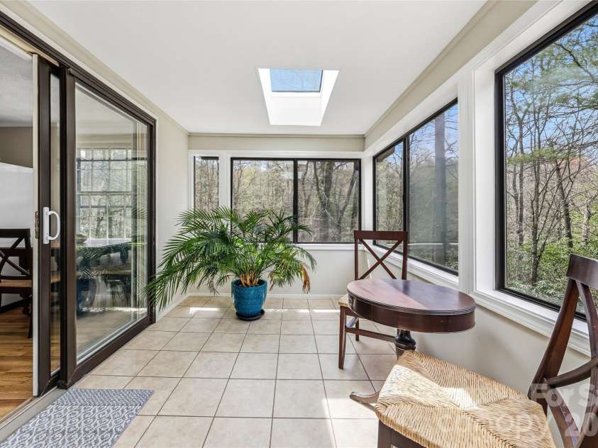 143 Rocky Ridge Road, Pisgah Forest, NC 28768.  MLS# CAR4364928, YatesRealty ID 13336. Sunroom