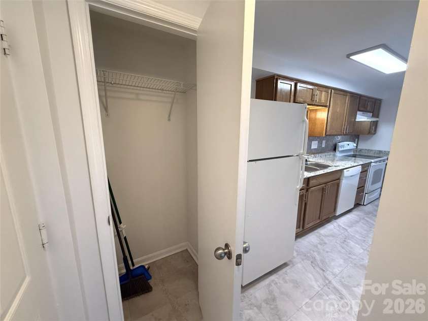 1645 Arlyn Circle, Charlotte, NC 28213.  MLS# CAR4354534, YatesRealty ID 13338. Coat closet by the front door.
