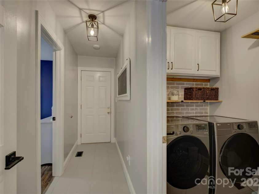 8322 Loma Linda Lane, Waxhaw, NC 28173.  MLS# CAR4238719, YatesRealty ID 13341. Back Hall way area to the 2 Car Side-Load Garage.