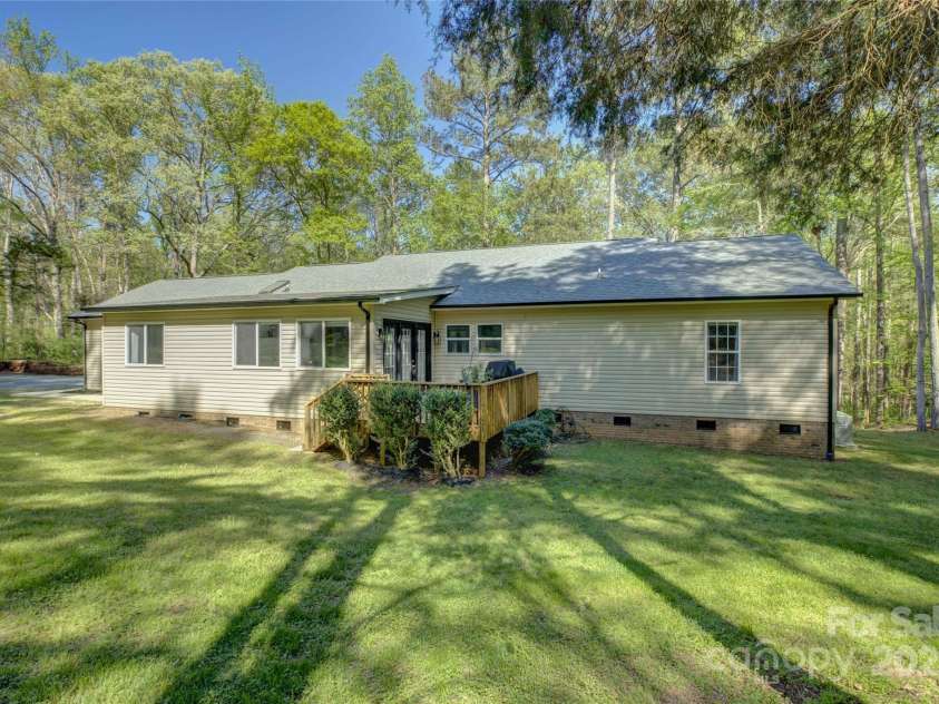 8322 Loma Linda Lane, Waxhaw, NC 28173.  MLS# CAR4238719, YatesRealty ID 13341. Back of the home.