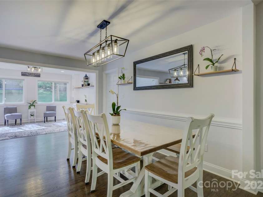 8322 Loma Linda Lane, Waxhaw, NC 28173.  MLS# CAR4238719, YatesRealty ID 13341. Dining Area with Designer Light Fixture.