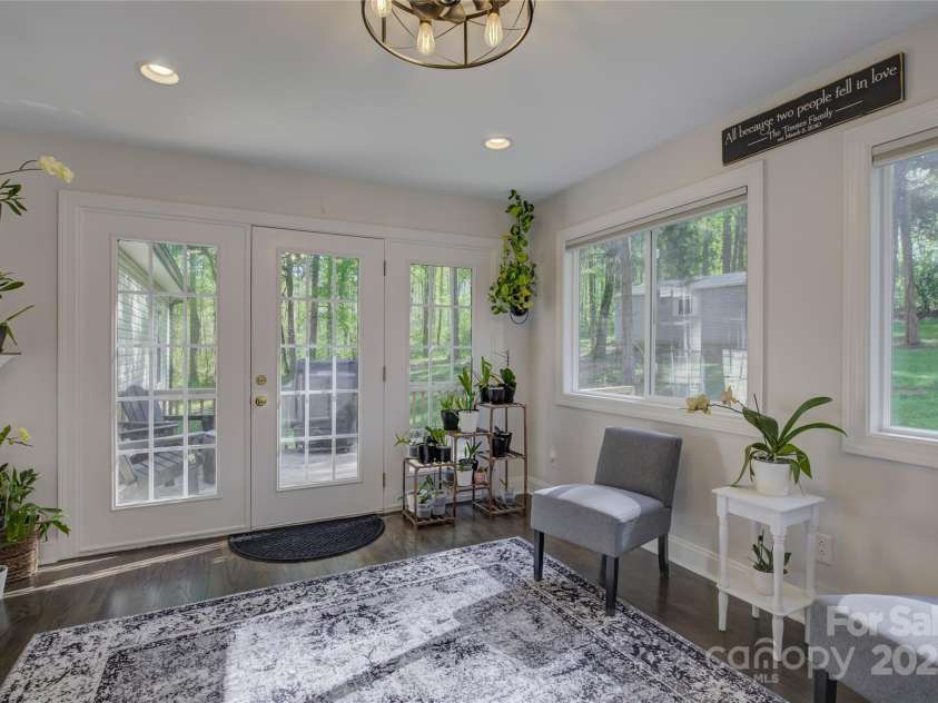 8322 Loma Linda Lane, Waxhaw, NC 28173.  MLS# CAR4238719, YatesRealty ID 13341. Door to private back deck off the sunroom.