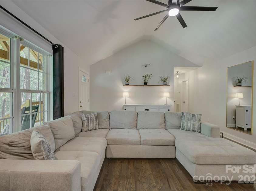 8322 Loma Linda Lane, Waxhaw, NC 28173.  MLS# CAR4238719, YatesRealty ID 13341. Great Room with Vaulted Ceiling and Fan.