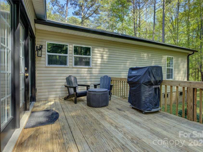 8322 Loma Linda Lane, Waxhaw, NC 28173.  MLS# CAR4238719, YatesRealty ID 13341. Private Deck Area off the Sunroom.