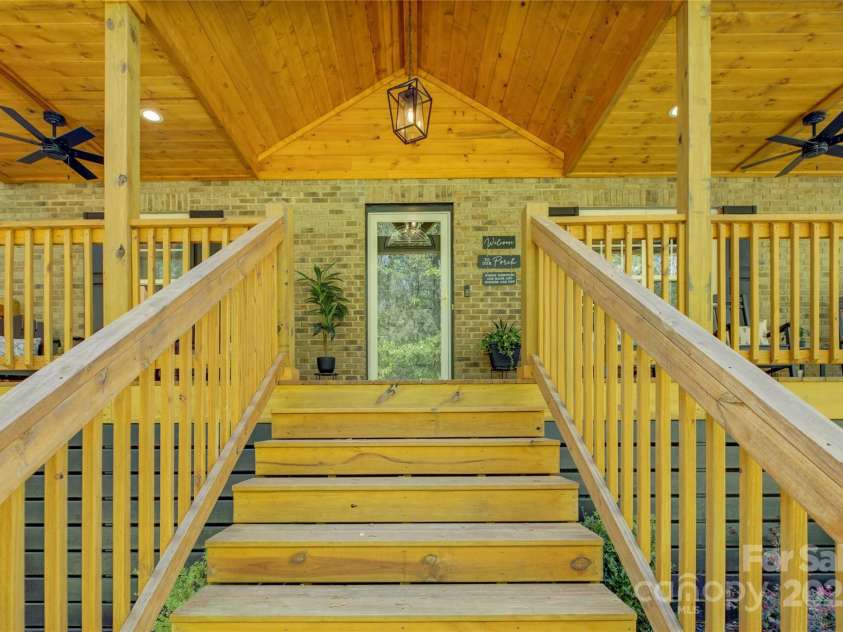 8322 Loma Linda Lane, Waxhaw, NC 28173.  MLS# CAR4238719, YatesRealty ID 13341. Steps to the gorgeous front sitting porch.