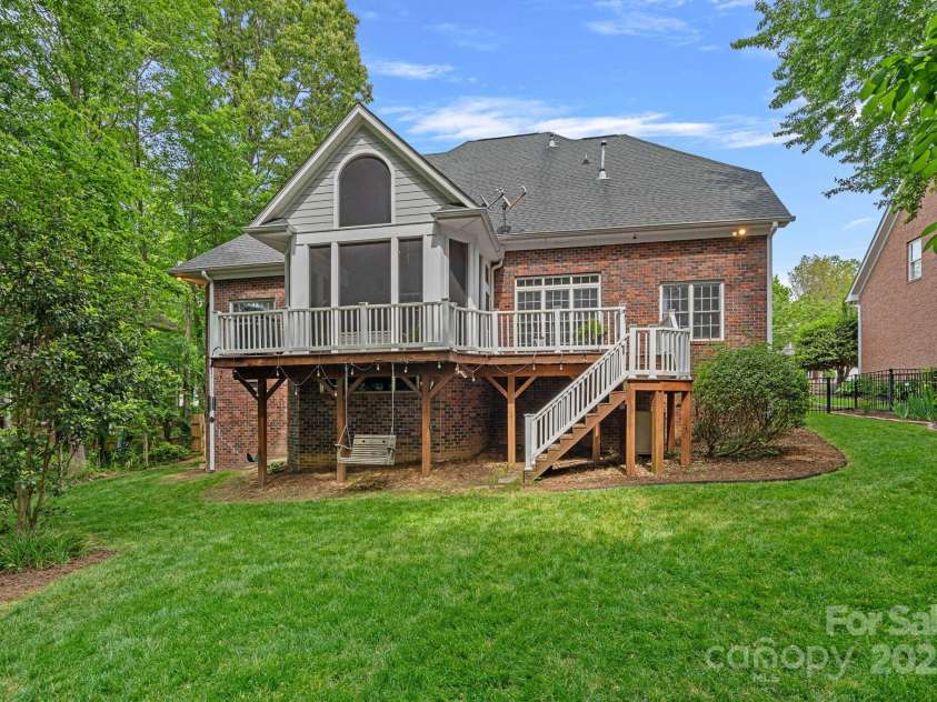 202 Whitmyre Court, Fort Mill, SC 29715.  MLS# CAR4251469, YatesRealty ID 13342. Expansive deck space (Trex), lots of storage area underneath the deck