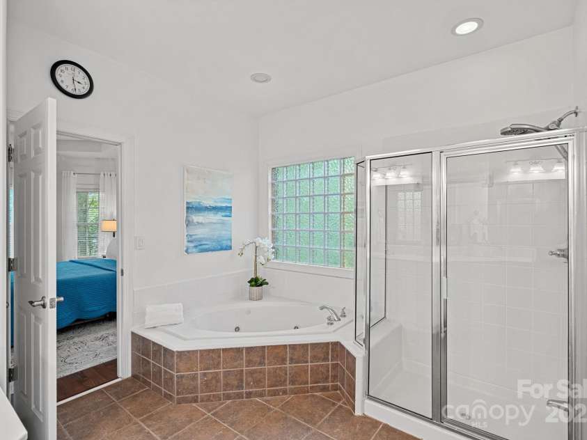 202 Whitmyre Court, Fort Mill, SC 29715.  MLS# CAR4251469, YatesRealty ID 13342. Primary bath w/ garden tub, separate shower