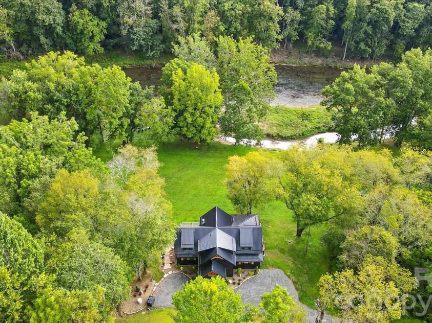 727 Riverwind Drive, Lansing, NC 28643.  MLS# CAR4368112, YatesRealty ID 13350. 