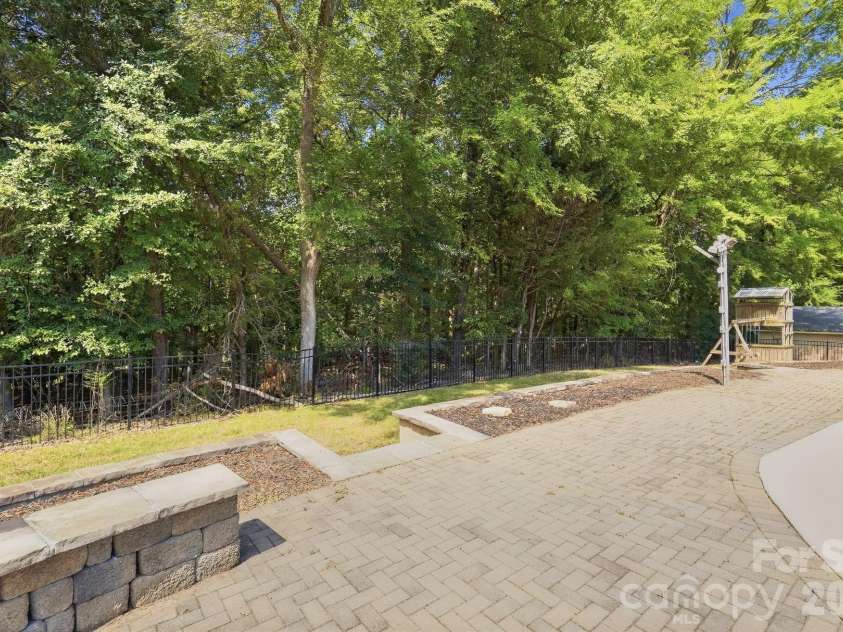 213 Lakeview Drive, Harrisburg, NC 28075.  MLS# CAR4426223, YatesRealty ID 13351. Backyard patio & Pool