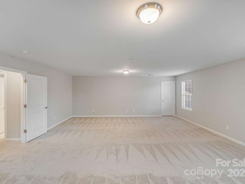 220 Kenway Loop, Mooresville, NC 28117.  MLS# CAR4231089, YatesRealty ID 13351. Could be used for a 5th bdr, bonus, movie, craft or playroom