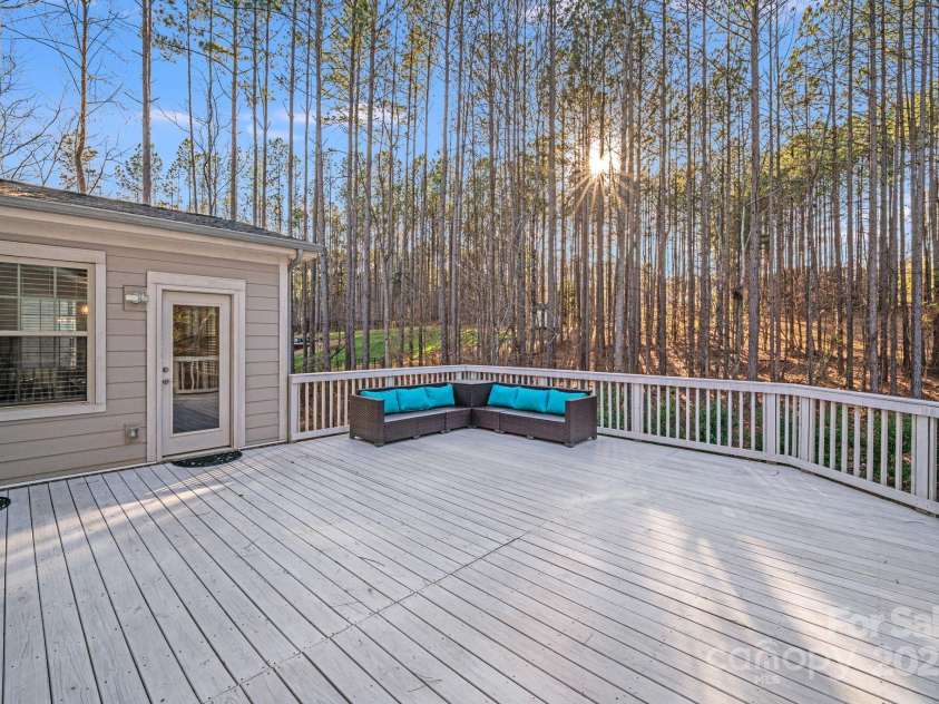220 Kenway Loop, Mooresville, NC 28117.  MLS# CAR4231089, YatesRealty ID 13351. Enjoy the sunsets from the spacious deck! Wildlife abound!