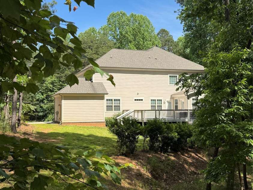 220 Kenway Loop, Mooresville, NC 28117.  MLS# CAR4231089, YatesRealty ID 13351. Gorgeous back yard with tall pines!