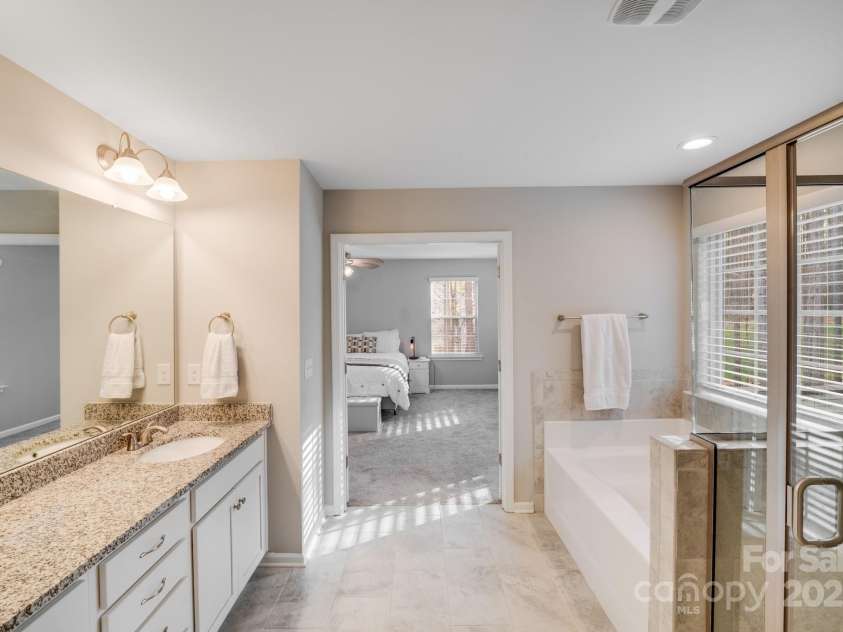 220 Kenway Loop, Mooresville, NC 28117.  MLS# CAR4231089, YatesRealty ID 13351. Owners bath - Garden Tub and Stand Up Shower