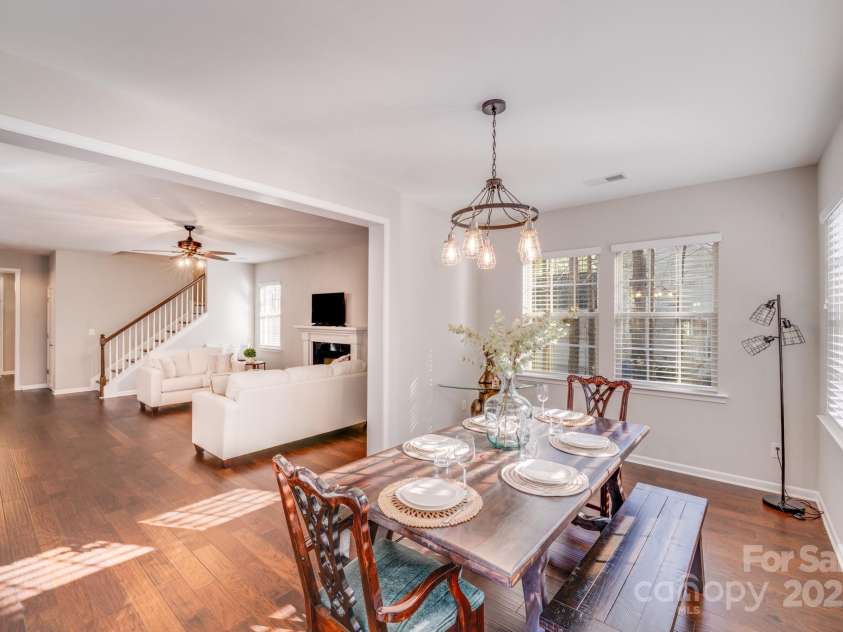 220 Kenway Loop, Mooresville, NC 28117.  MLS# CAR4231089, YatesRealty ID 13351. Windows surround this gorgeous sunroom!