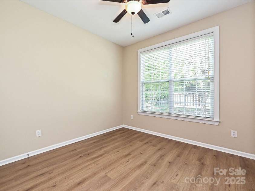 9700 Ravenscroft Lane, Concord, NC 28027.  MLS# CAR4256328, YatesRealty ID 13353. Guest Bedroom-Main Floor