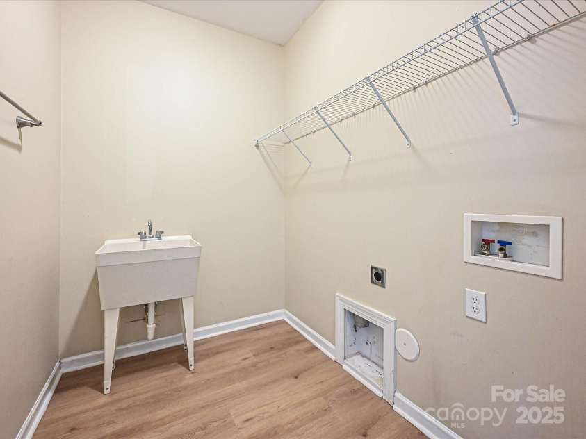 9700 Ravenscroft Lane, Concord, NC 28027.  MLS# CAR4256328, YatesRealty ID 13353. Laundry Room-Main Floor