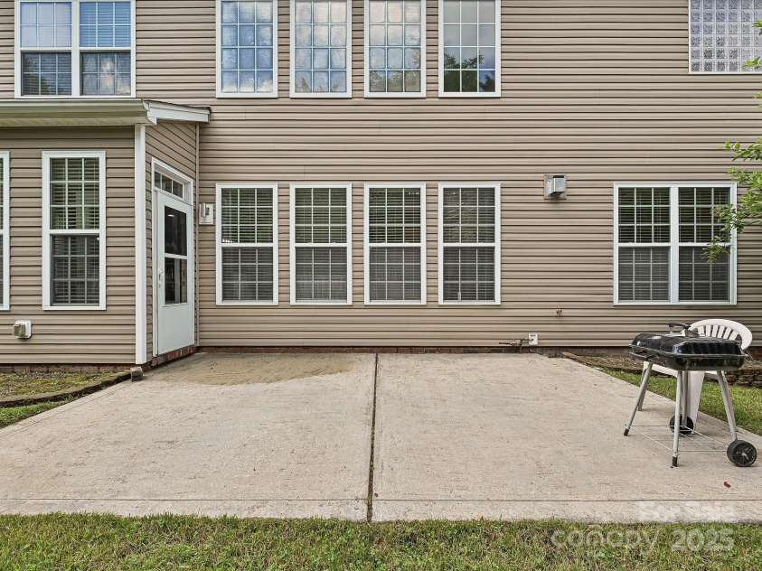 9700 Ravenscroft Lane, Concord, NC 28027.  MLS# CAR4256328, YatesRealty ID 13353. Patio