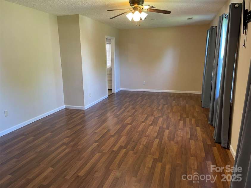 424 Creekside Drive, Asheville, NC 28804.  MLS# CAR4259883, YatesRealty ID 13362. Formal dining area viewed from living room.