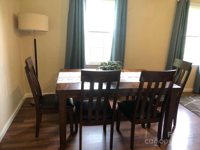 424 Creekside Drive, Asheville, NC 28804.  MLS# CAR4259883, YatesRealty ID 13362. Formal dining room connects with kitchen. Home is now vacant.