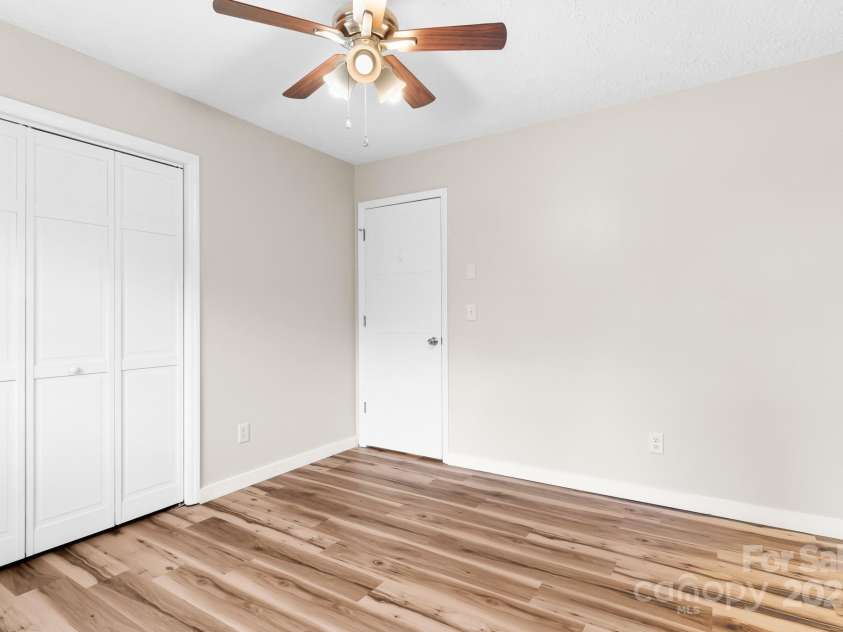 217 Royal Pines Drive, Arden, NC 28704.  MLS# CAR4257398, YatesRealty ID 13374. Front bedroom