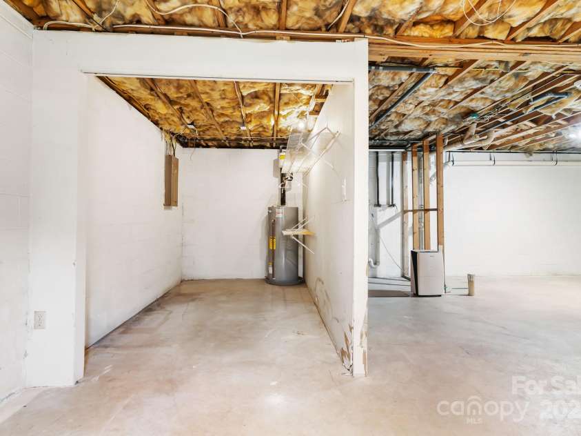 217 Royal Pines Drive, Arden, NC 28704.  MLS# CAR4257398, YatesRealty ID 13374. Newer water heater in daylight basement