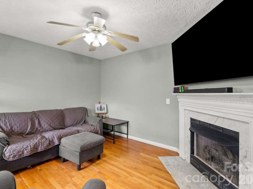 842 Grouse Road, Clyde, NC 28721.  MLS# CAR4326443, YatesRealty ID 13378. Living room