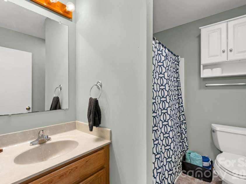 842 Grouse Road, Clyde, NC 28721.  MLS# CAR4326443, YatesRealty ID 13378. Upstair Hall Bath