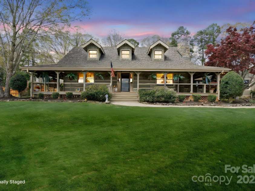 1620 London Road, Mooresville, NC 28115.  MLS# CAR4281112, YatesRealty ID 13387. Beautiful Hearthstone Log Cabin is the Heart of the estate.