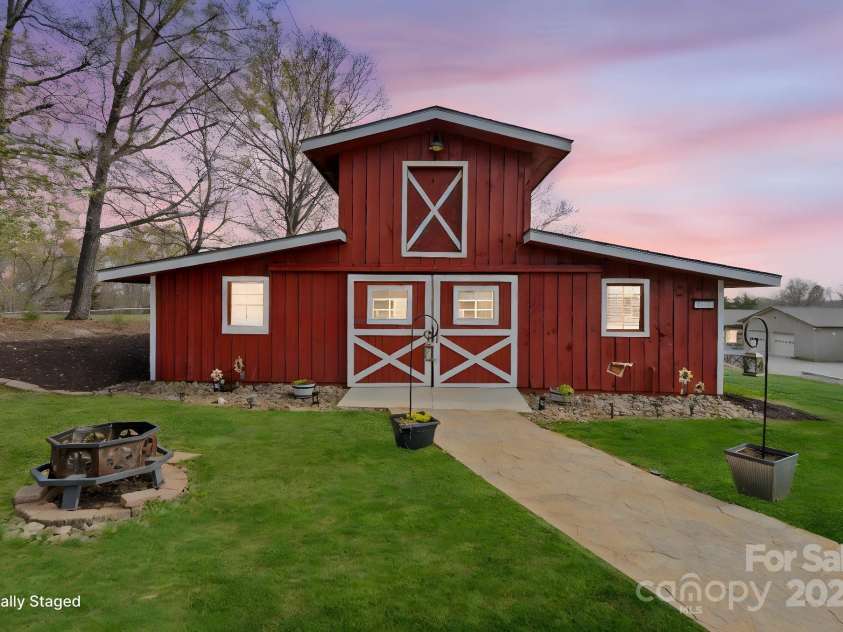 1620 London Road, Mooresville, NC 28115.  MLS# CAR4281112, YatesRealty ID 13387. Picture Perfect Party Barn equipped with party rooms, bathroom facilities, a kitchen, and floored for future upstairs expansioin