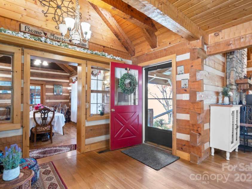 1620 London Road, Mooresville, NC 28115.  MLS# CAR4281112, YatesRealty ID 13387. The side door off of the front wrap around porch of the main residence. Look at the craftsmanship!