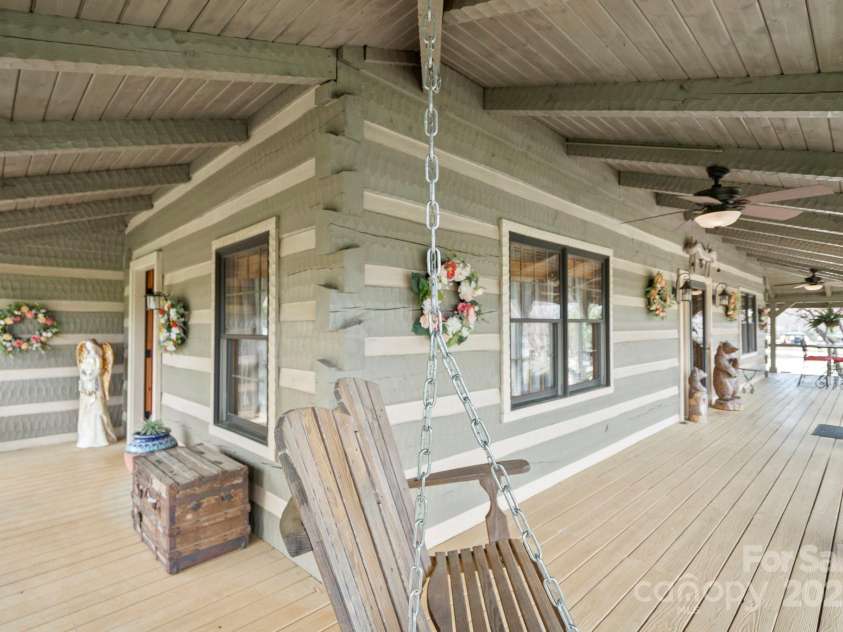 1620 London Road, Mooresville, NC 28115.  MLS# CAR4281112, YatesRealty ID 13387. The Wrap around Porch of the Main Residence. There is over 1100 sq feet of covered porch space at the main residence.