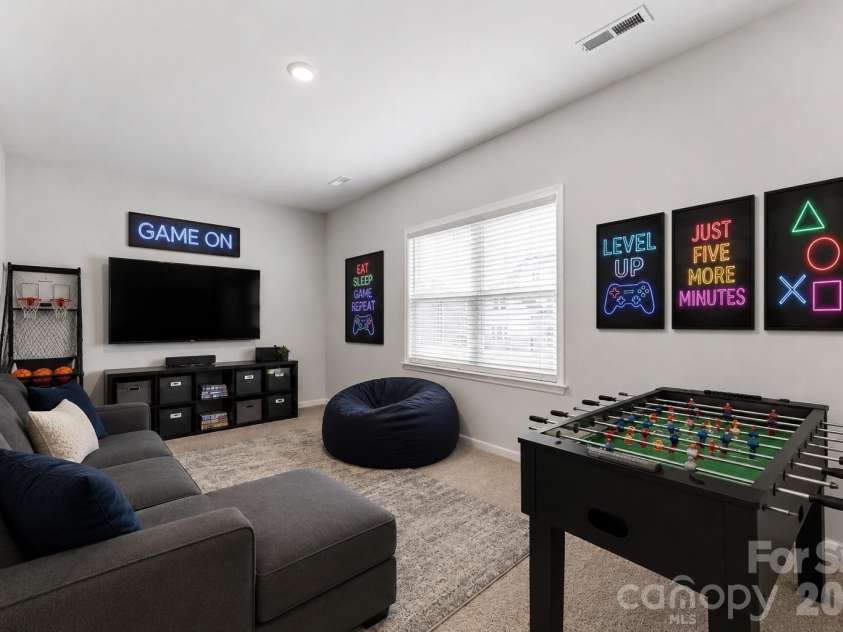 346 Waterlynn Road, Mooresville, NC 28117.  MLS# CAR4398070, YatesRealty ID 13387. Virtually staged-game room