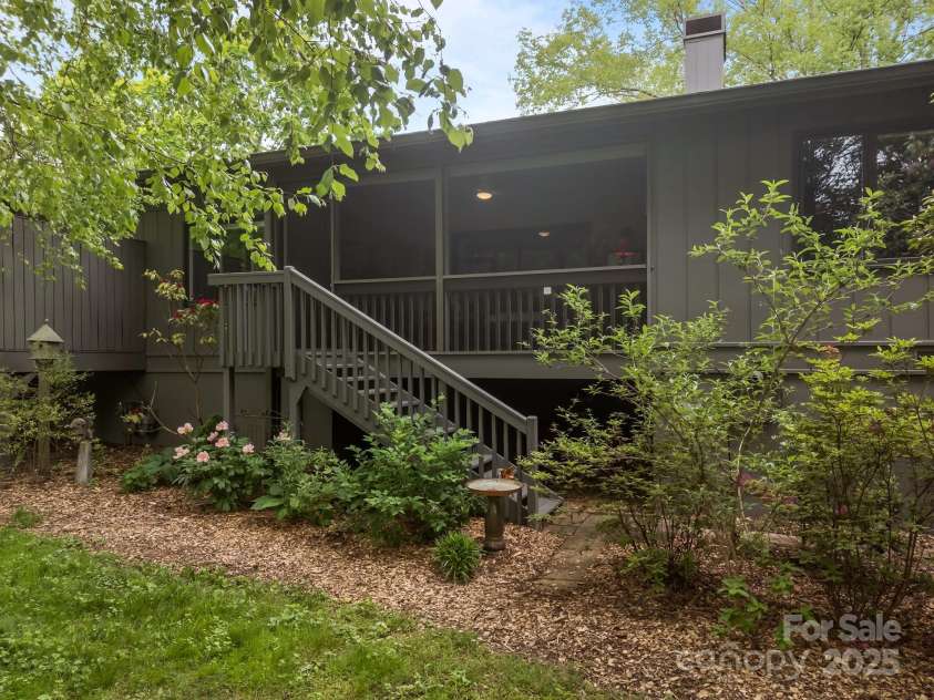 606 Crowfields Lane, Asheville, NC 28803.  MLS# CAR4251508, YatesRealty ID 13388. Access to yard and flower garden