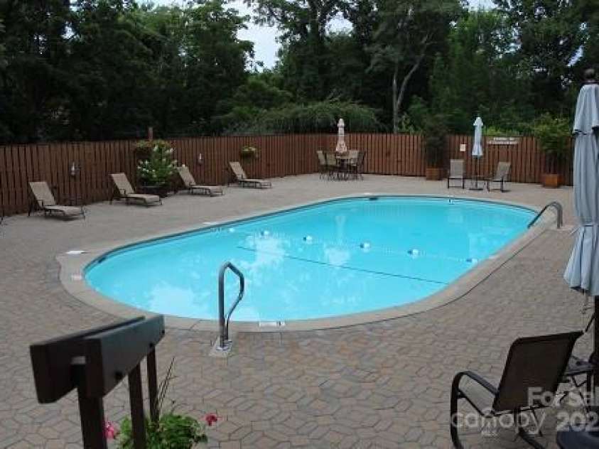 606 Crowfields Lane, Asheville, NC 28803.  MLS# CAR4251508, YatesRealty ID 13388. Heated pool