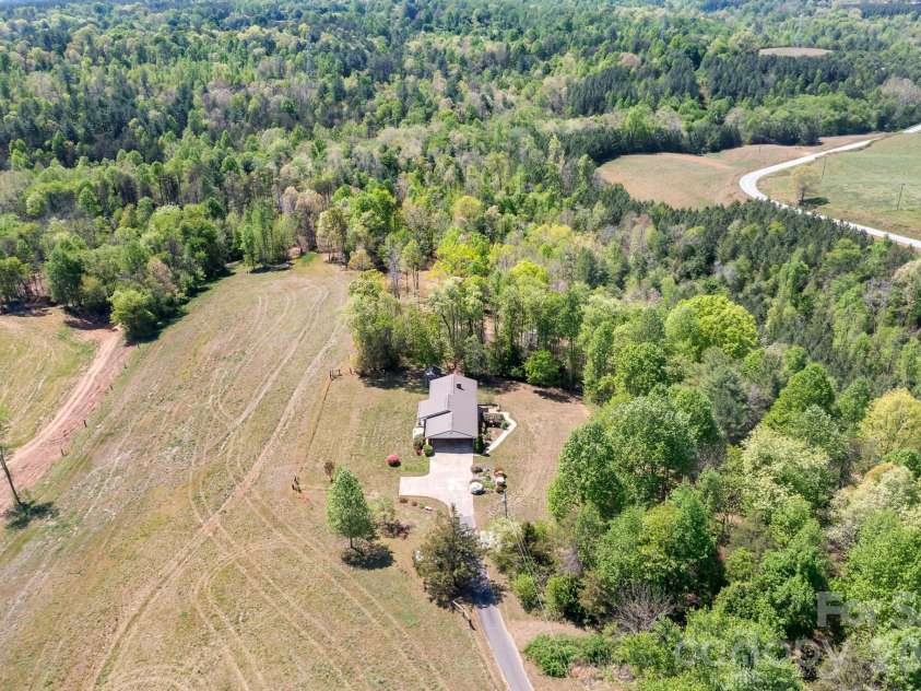 5343 Cannon Drive, Granite Falls, NC 28630.  MLS# CAR4366225, YatesRealty ID 13393. 1 acre lot surrounded by privacy