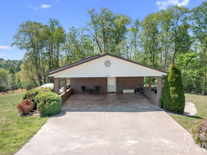5343 Cannon Drive, Granite Falls, NC 28630.  MLS# CAR4366225, YatesRealty ID 13393. Long driveway with ample parking space