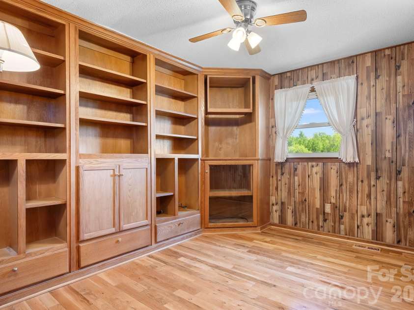 5343 Cannon Drive, Granite Falls, NC 28630.  MLS# CAR4366225, YatesRealty ID 13393. Second bedroom. (Shelving could be removed, not secured to wall)